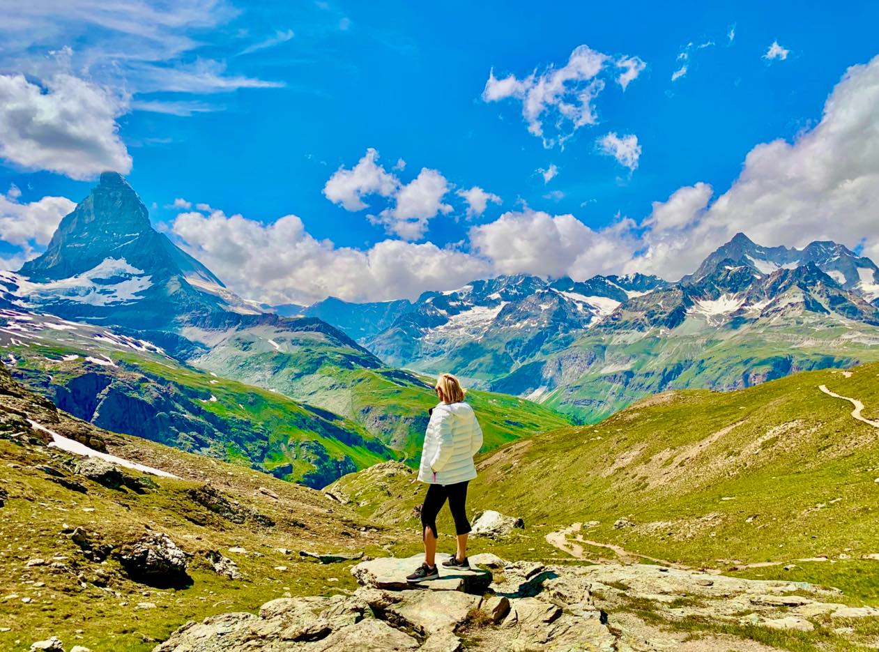 Cyndi Bridger Bugbee overlooking the Swiss Alps and Matterhorn